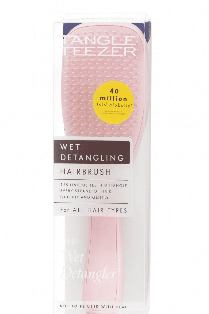 Brosse Wet Detangler de Tangle Teezer utilisée sur cheveux crépus 4C préparés avec un soin